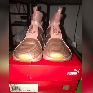 Gently used women Puma sneaker Rose Pink metallic